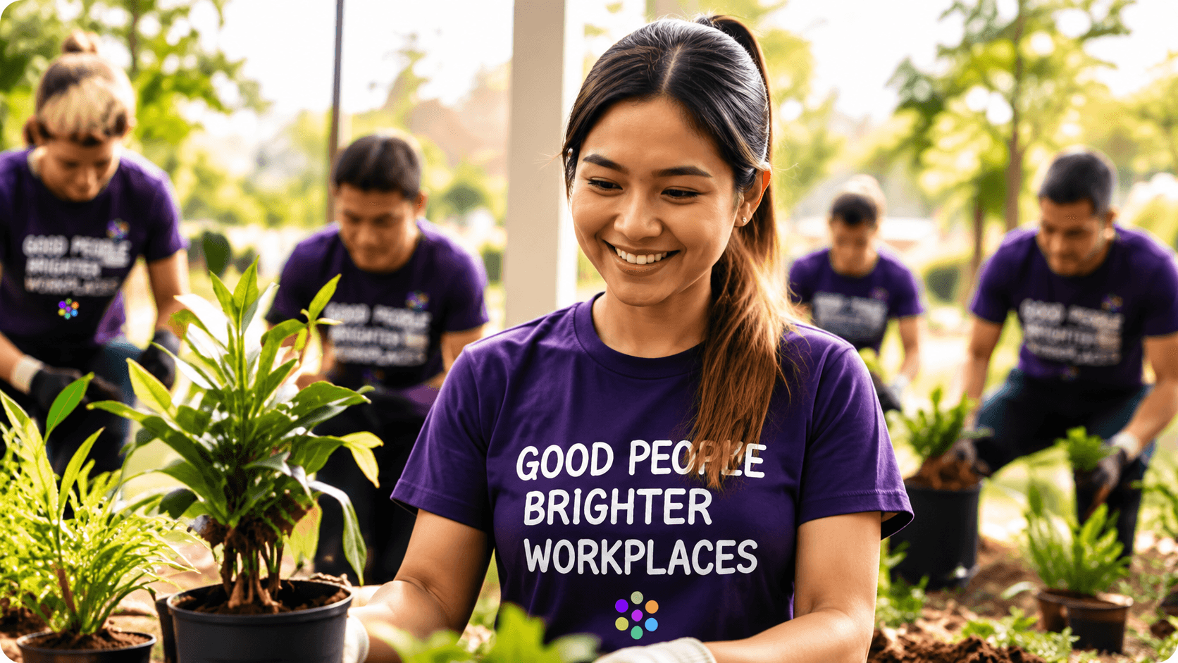 Workplace volunteers planting together in a community garden.